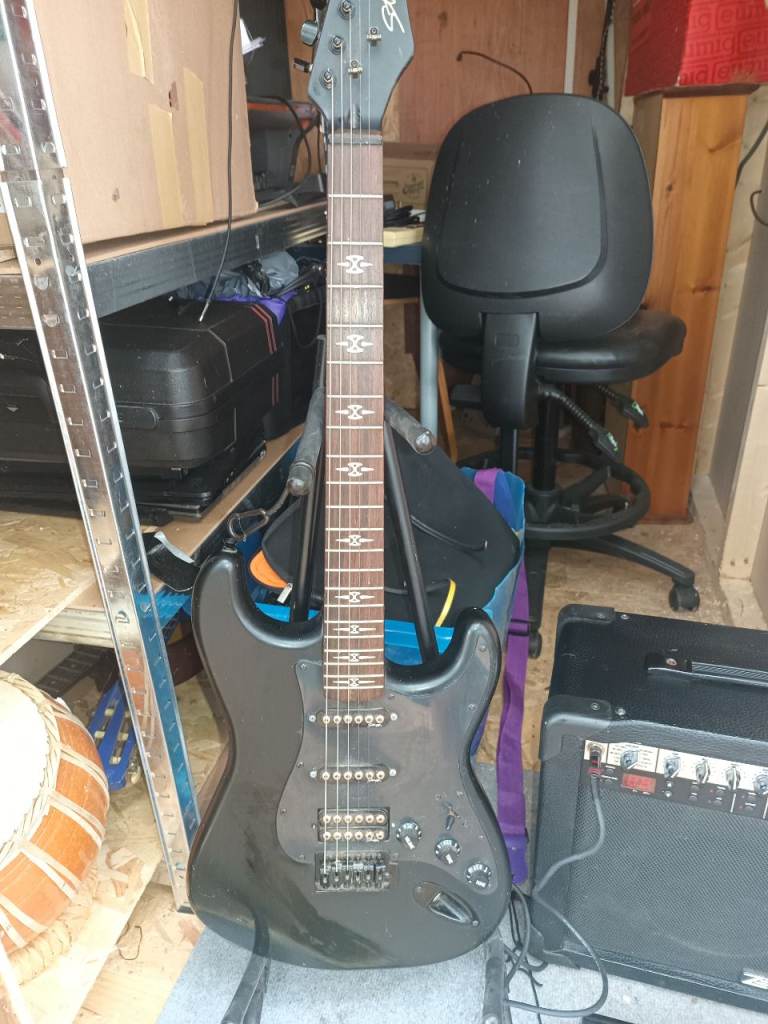 Stagg electric guitar, Roland zoom-15 amp and Korg A5 Multi FX pedal 