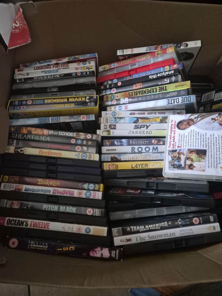 Free 1 box of dvds and 1 box of vhs tapes