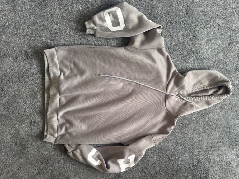 Grey Hoodie with White Arm Print – Good Condition