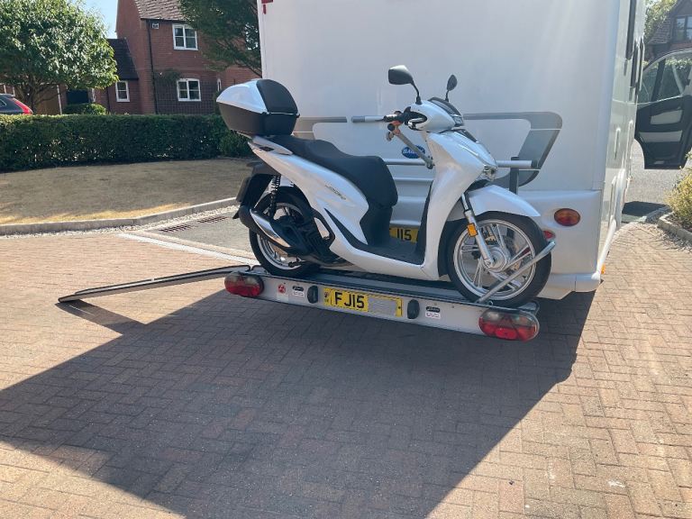 Motorcycle/ Scooter carrier.