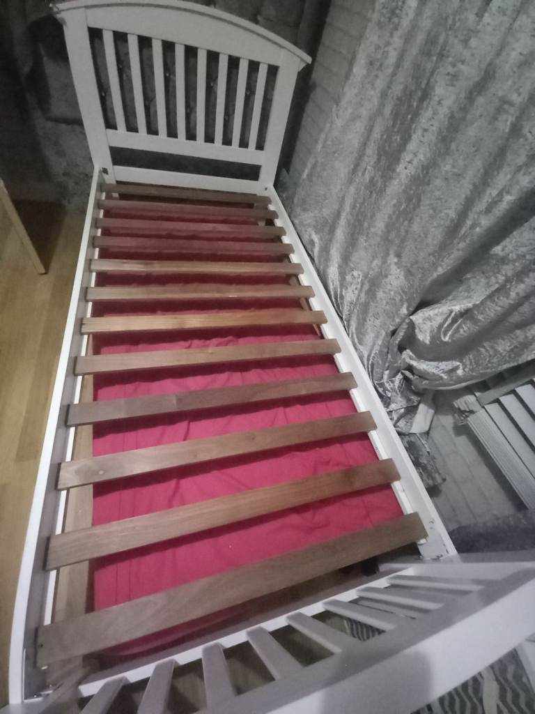 White wooden single bed frame