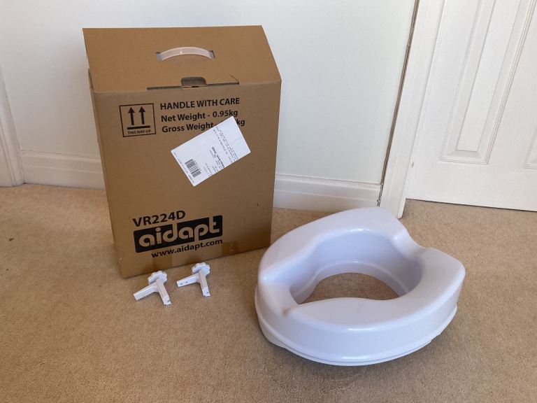 Aidapt raised toilet seat.