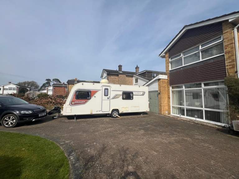 Lovely family sized caravan four berth fixed bed in very good condition