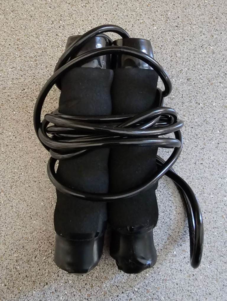 Skipping Rope with weighted handles. Like new. 