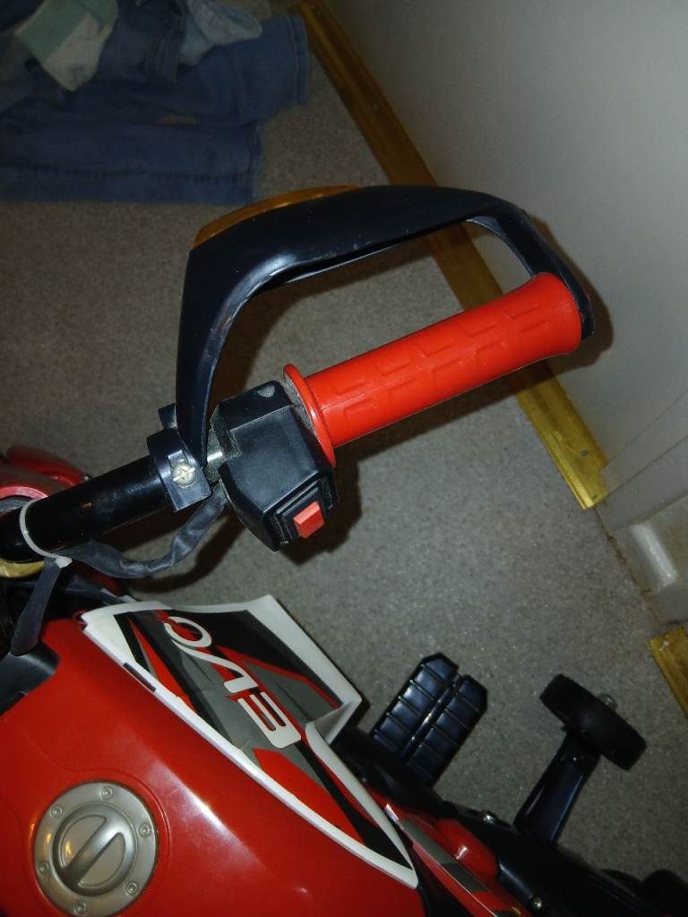 Red EVO Electric Kids' Motorbike Ride-On Toy – Good Condition