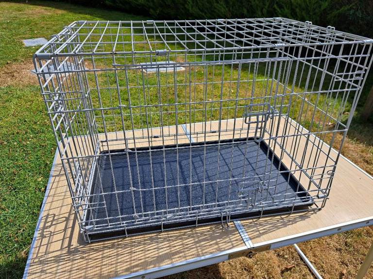 Dog cage. Grey. 30" x 19" x 21" high.