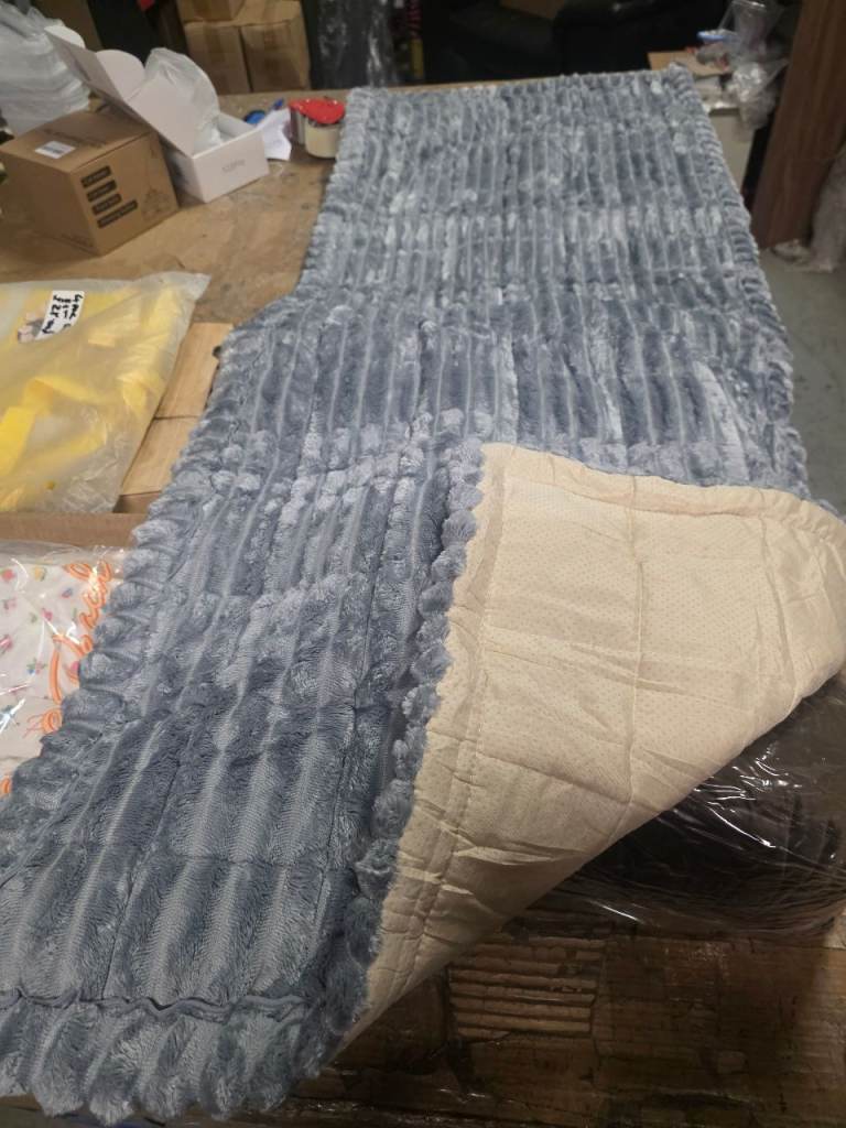 A new still packed soft touch grey car seat pet blanket / sofa seat pet blanket.