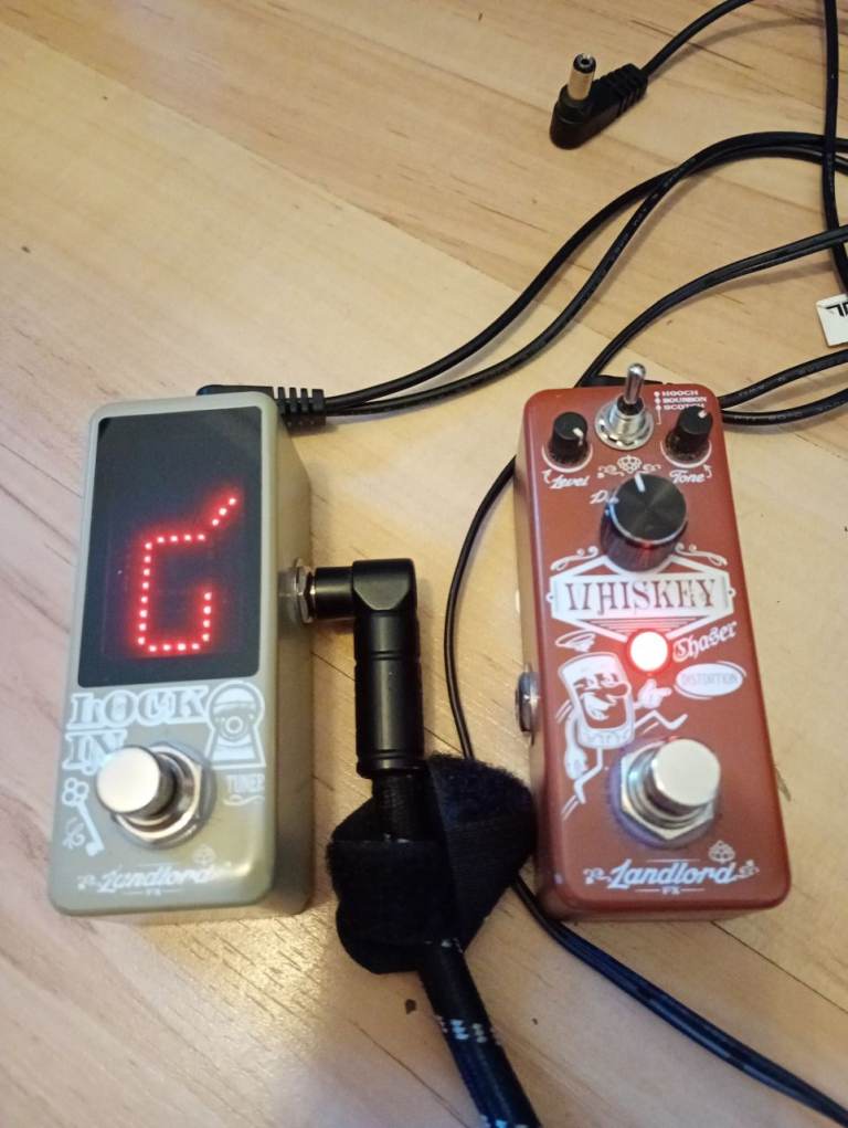 image for Landlord tuner pedal and distortion pedal, some cables, and multi power source.