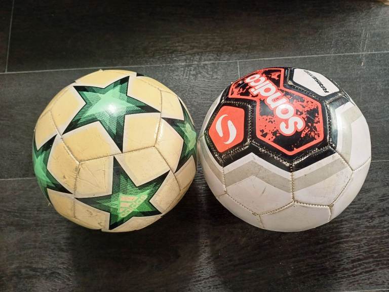 Two Used Footballs CASH ONLY