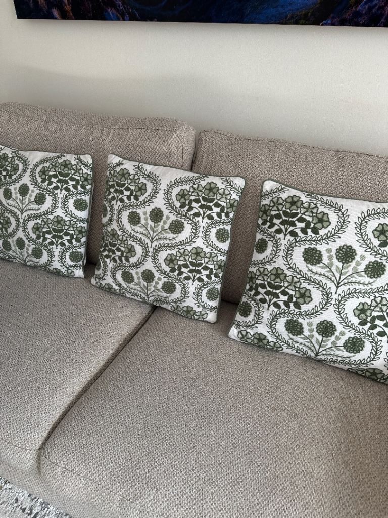 Three green and white cushions £20