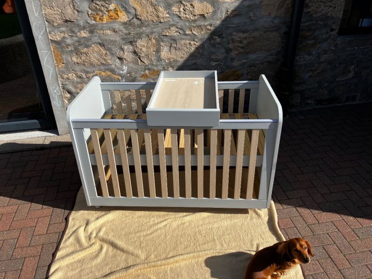 Cot/toddler bed/changing station 