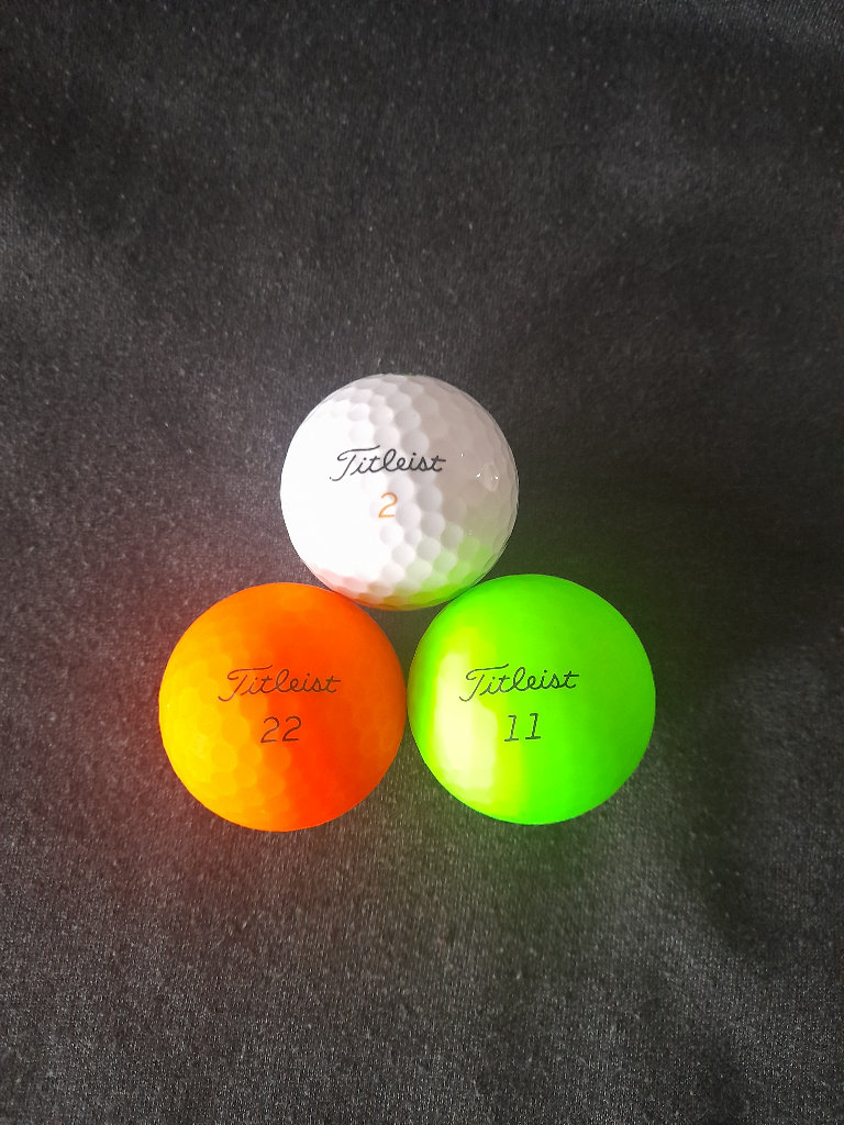 24 Used Titleist Velocity Golf Balls. 