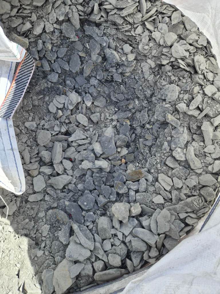 Free to collect. 40mm graphite slate ~500kg in bag and on pallet