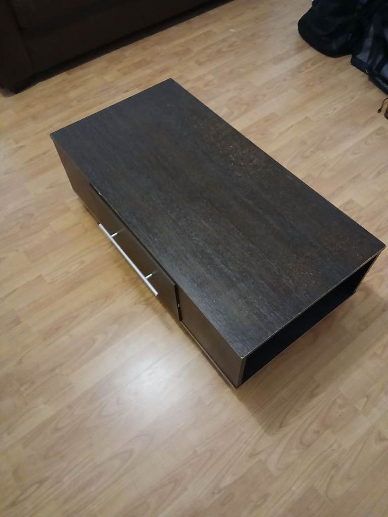 Coffee table with drawer. Storage void on back and both side