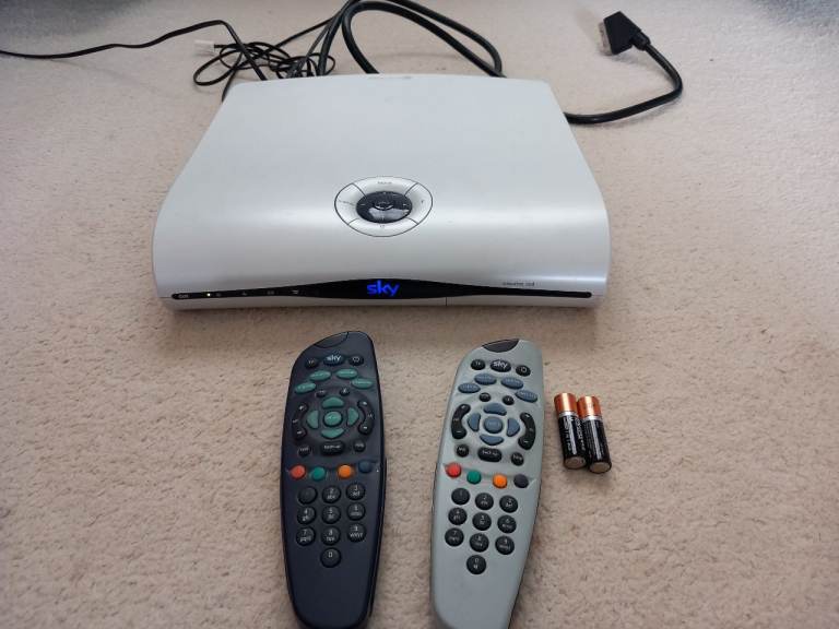 Sky satellite box with 2 controls in working order.  Buyer to collect.
