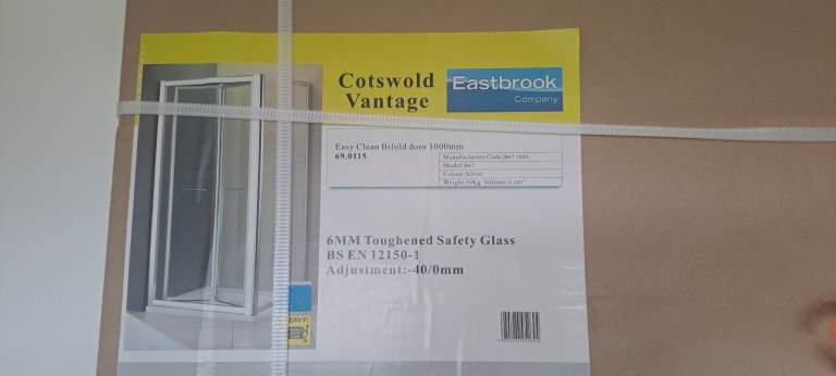 Bi fold door shower enclosure 