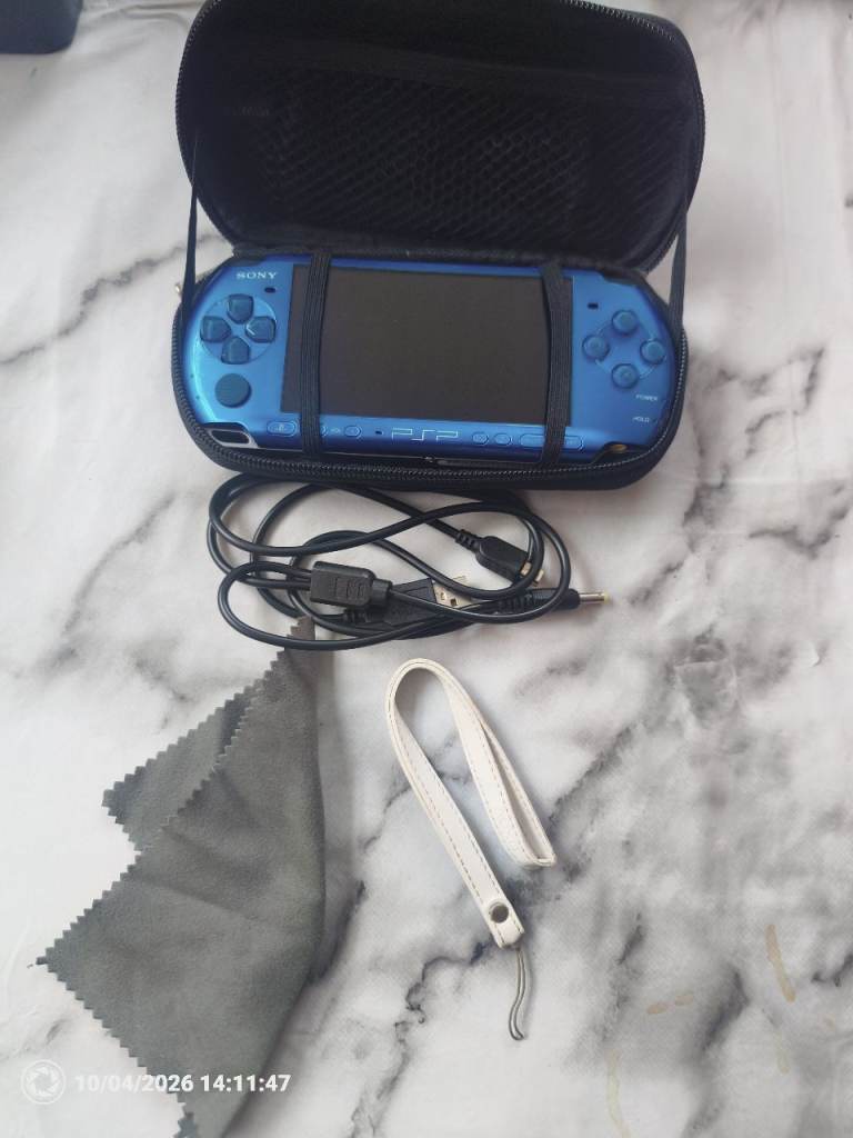 Psp handheld with case and games