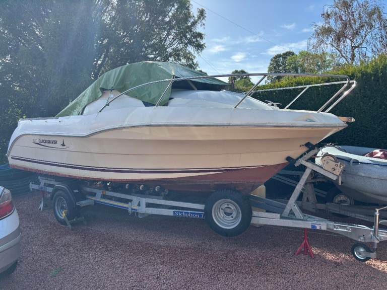 Mercury Quicksilver 620 Sport OB (no engine) on a Nicholson NT1800 Trailer