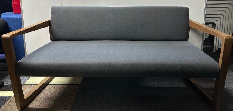 Durable sofa with wooden arms 