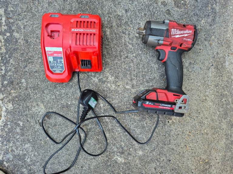 Milwaukee M18 FUEL Impact Wrench with Charger – Good Condition