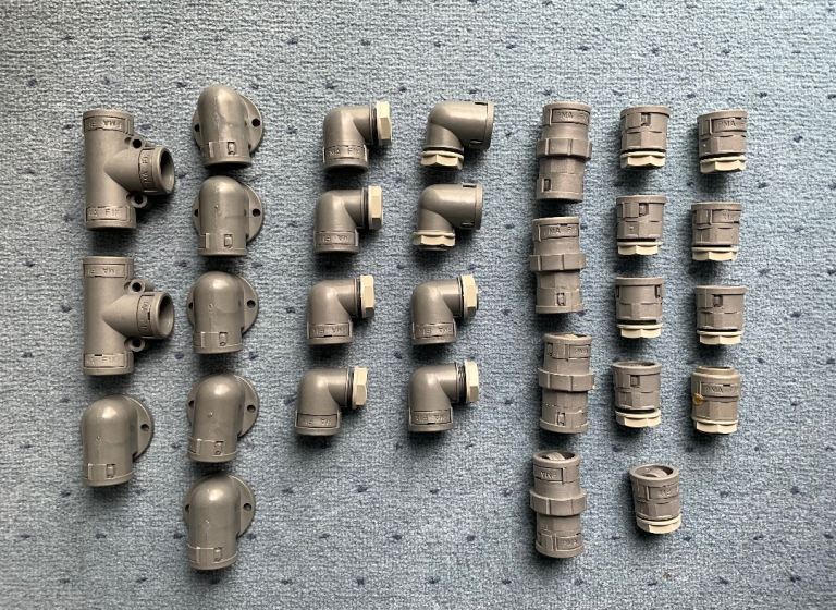 Selection of PMA Fix plastic 20mm conduit fittings. New.