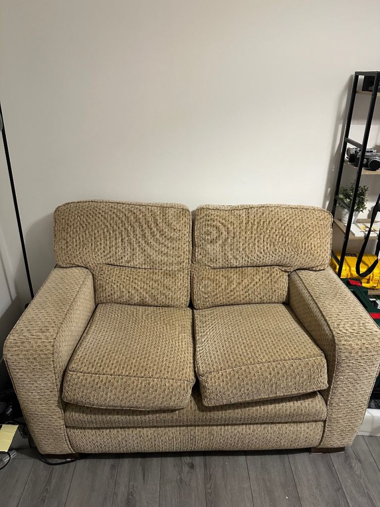 Free beige two seat sofa