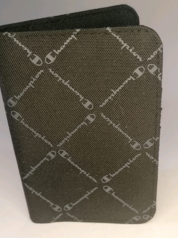 Champion card holder. New. 