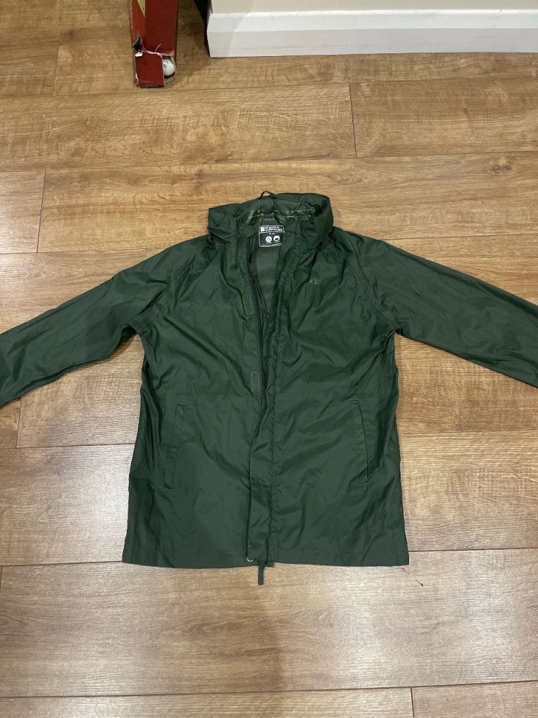 Kids waterproof pack away jacket never worn 