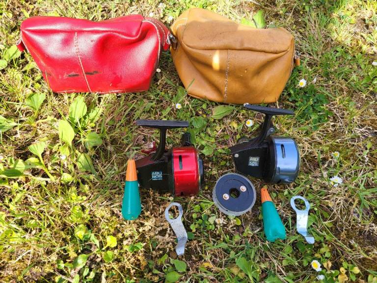 Pair of Vintage Fishing Reels with Cases and Spares