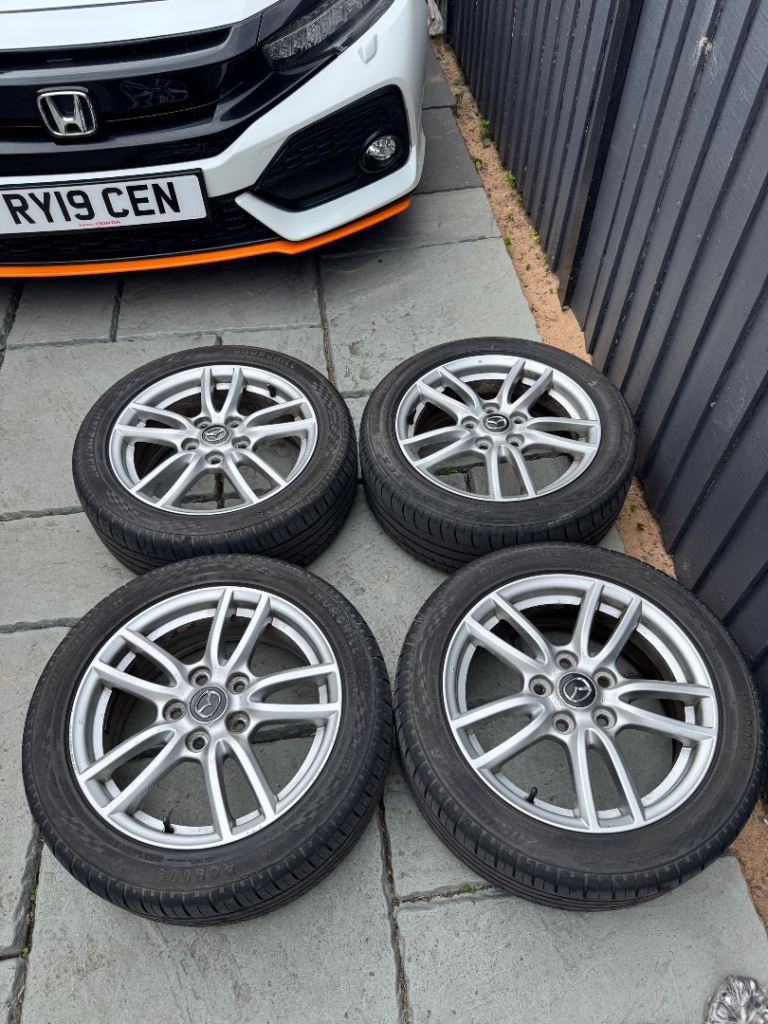 set of 4 genuine 16" Mazda MX-5 NC alloy wheels with tyreS