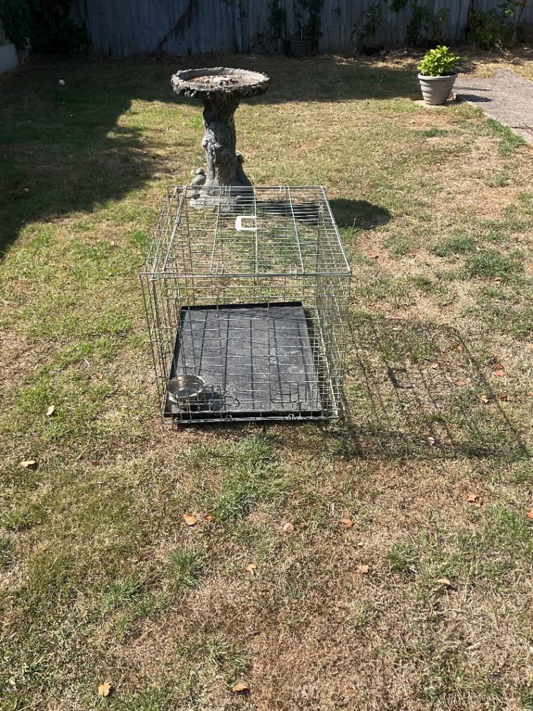 Dog cage, £10 