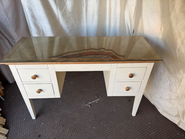 White wooden desk with 4 drawers and glass top can deliver 