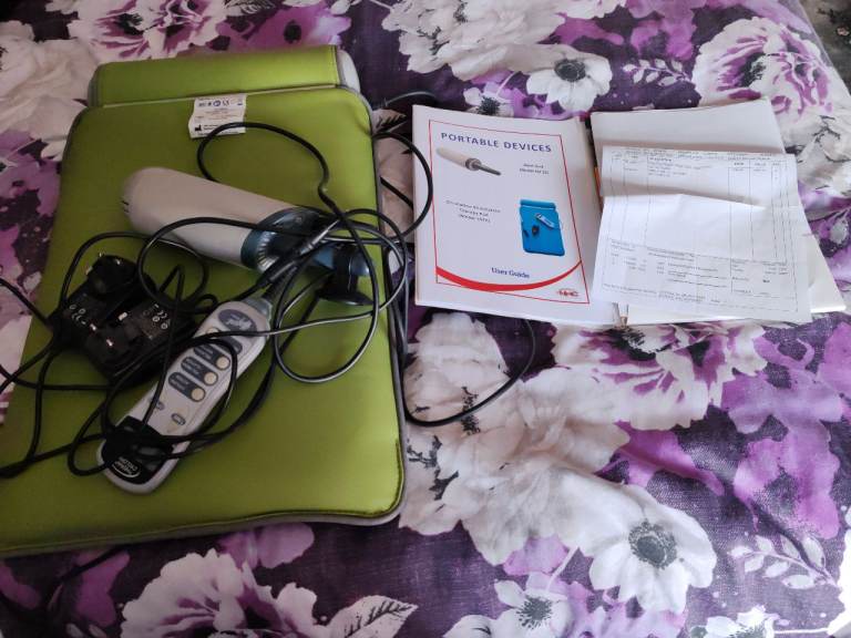 NHC portable device circulation stimulation therapy pad model CSTP and hand unit model HU 15