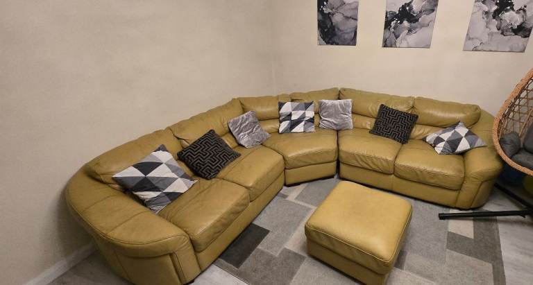 Leather corner sofa with ottoman footstool 