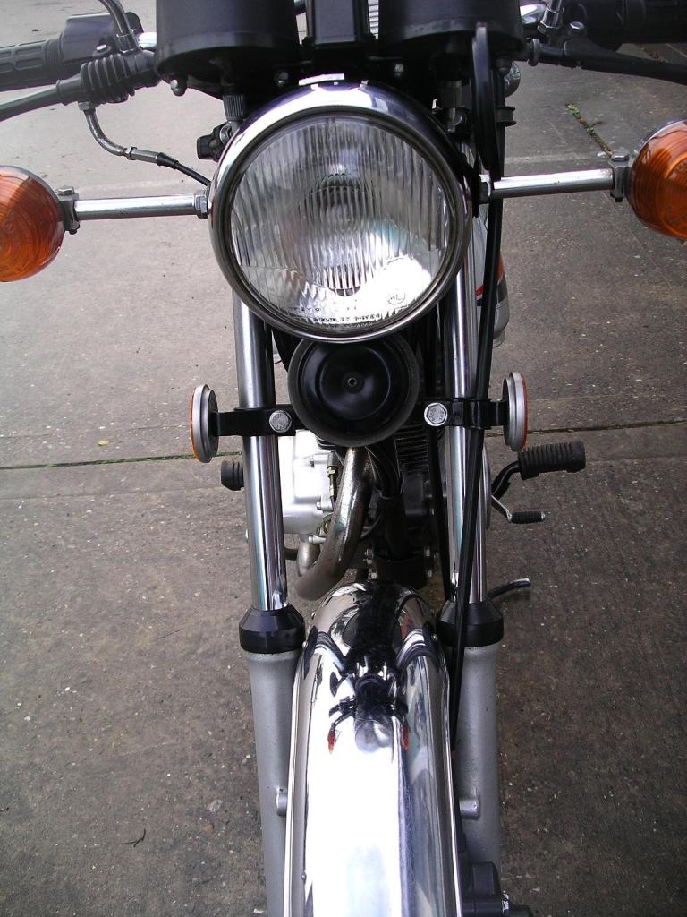 Honda CB100N only 11000 miles and supreme condition. Historic reg.