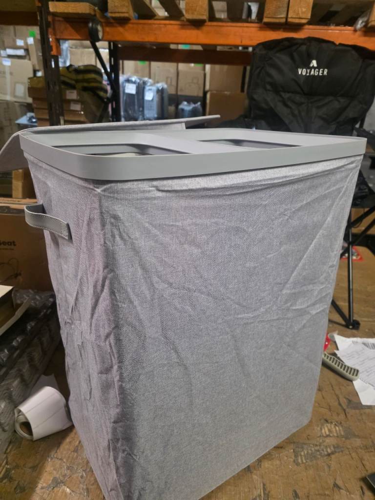 A new grey Collapsible Double Laundry Basket. 