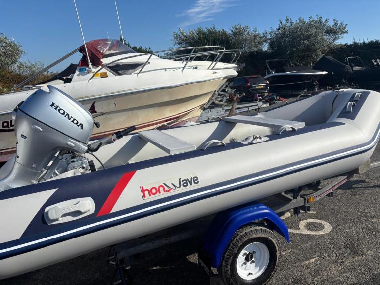 Honwave T38 , with Honda 20 hp engine and trailer