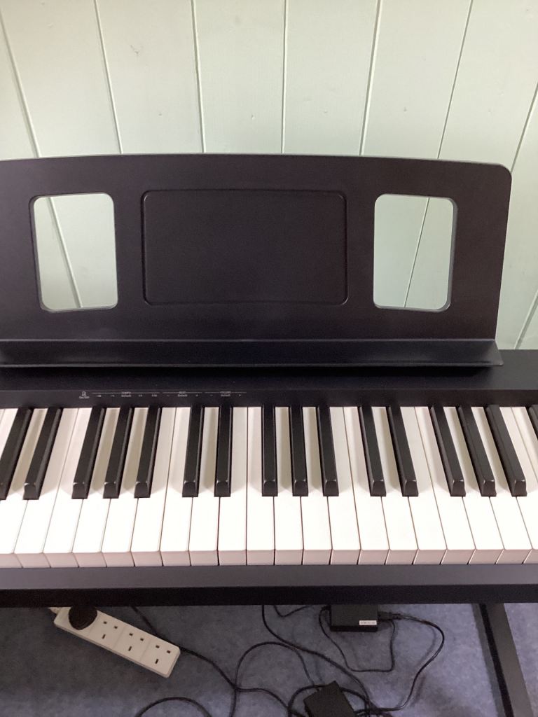 Roland FP10 digital piano with stand and stool