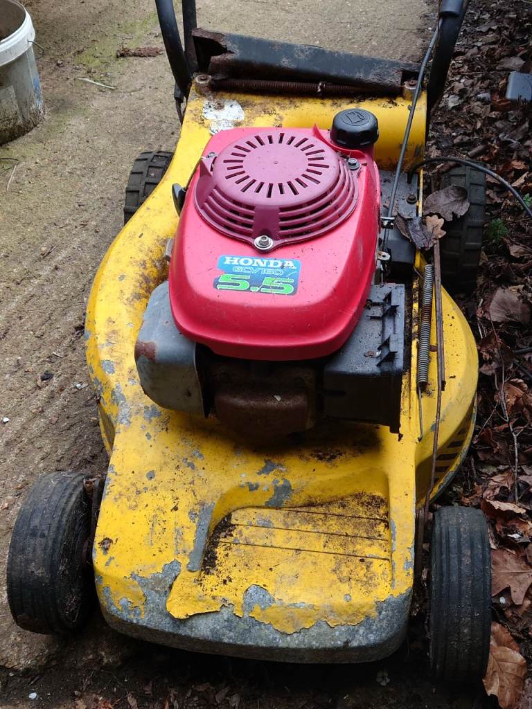 7 Lawn mowers spares or repairs, 3x Honda engines, rotavator, scarifier, boxes bags blades etc