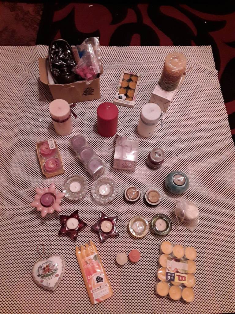 A variety of 48 candles/  1 incense burner