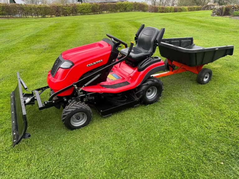 Countax B60 4 TRAC 4WD ride on mower with snow plow and trailer