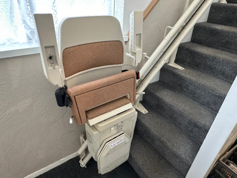 Halton Sapphire Curved Stairlift in Excellent Working Condition with 2 Remotes