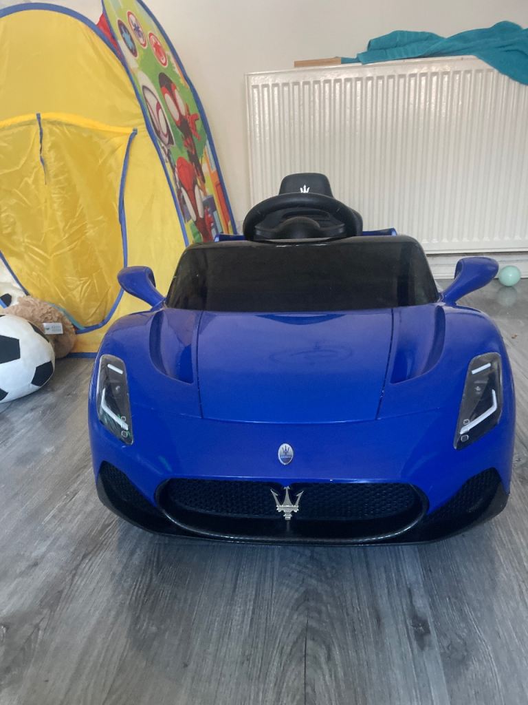 Blue Maserati Ride-On Car – Good Condition