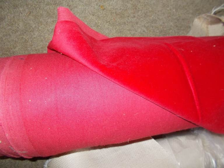 Rolls of fabric remnants suitable for dressmaking or curtains.