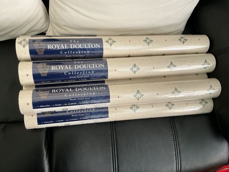 Seven rolls of Vymura ready pasted wallpaper.