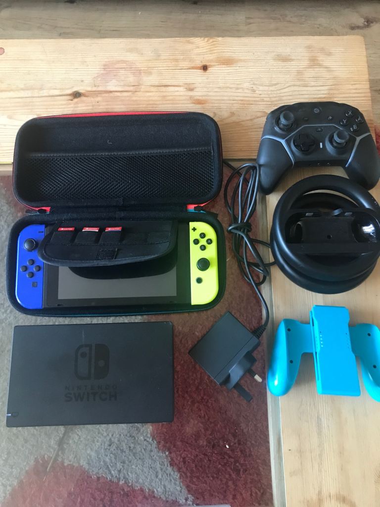 Nintendo Switch - + 3 Games