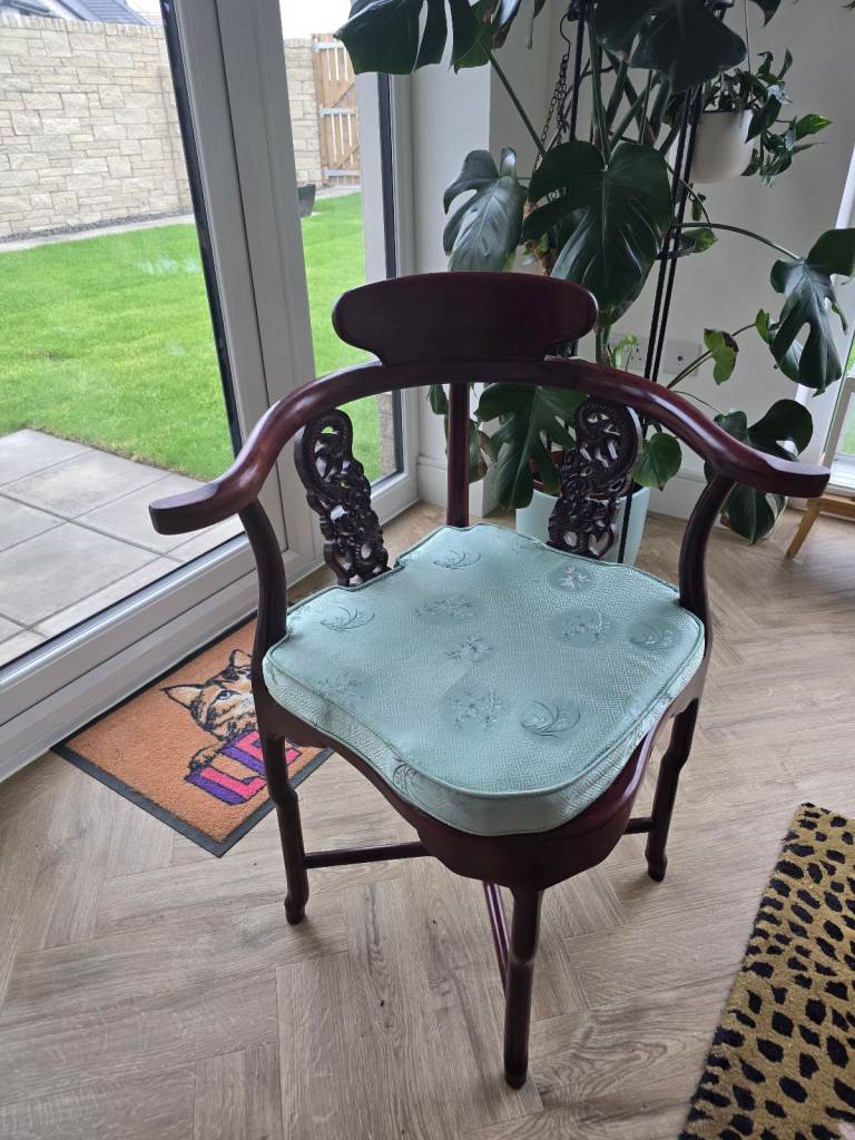 Traditional carved corner wooden chair