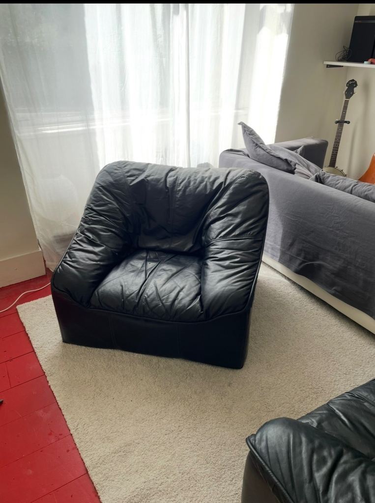 Black leather arm chairs 