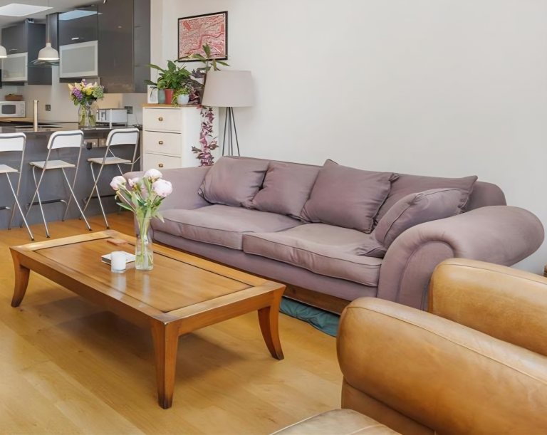 Comfortable Purple Fabric Sofa – Good Condition