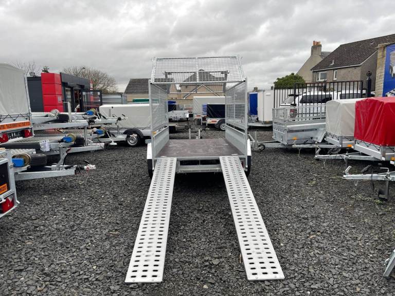BRAND NEW 10FT X 5FT TWIN AXLE MASTER HEAVY DUTY TRAILER WITH 80CM MESH AND RAMPS 2700KG BRAKED